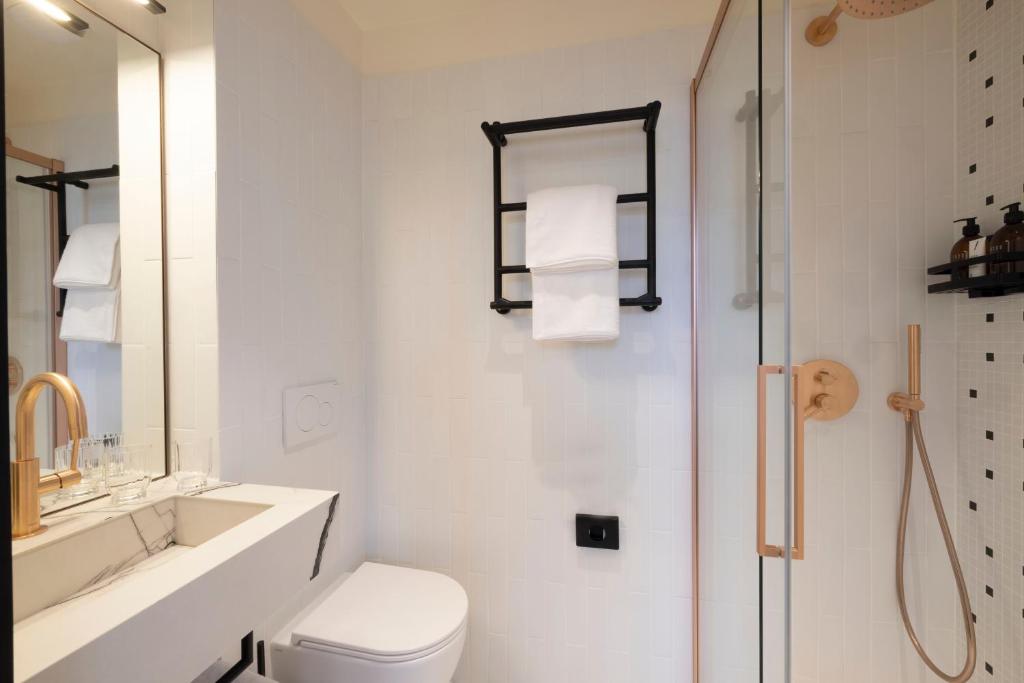 Bathroom - small but adequate with Disco lights - Picture of Albert's  Hotel, Paris - Tripadvisor
