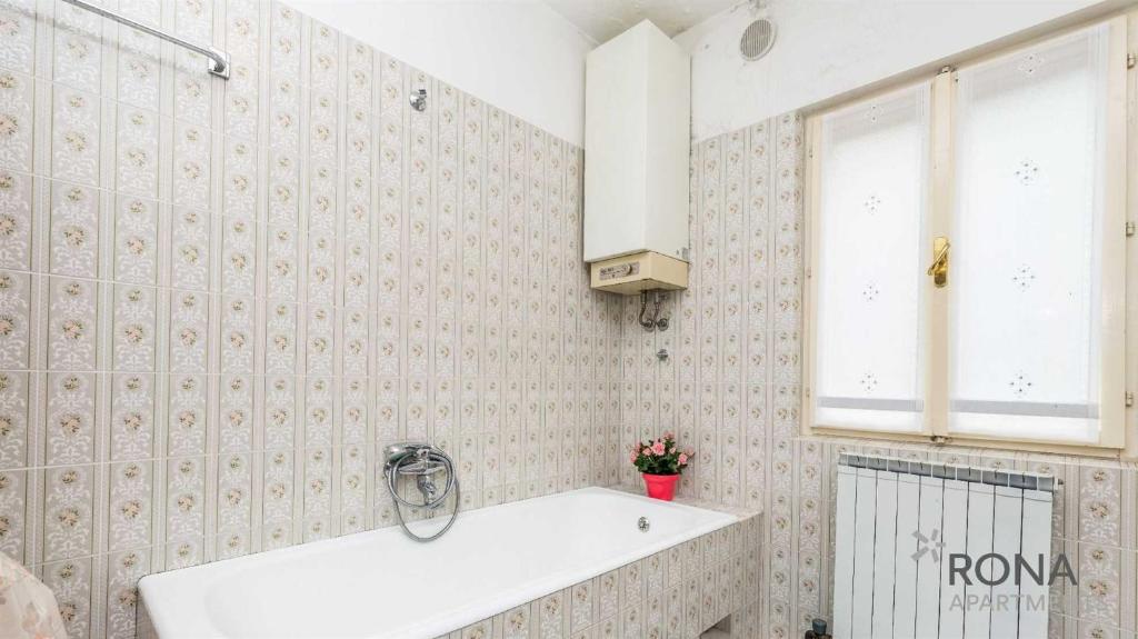 Łazienka w obiekcie Rona Apartments Ani