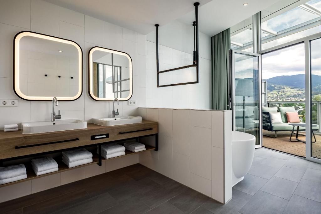 Vannituba majutusasutuses Four Points by Sheraton Panoramahaus Dornbirn