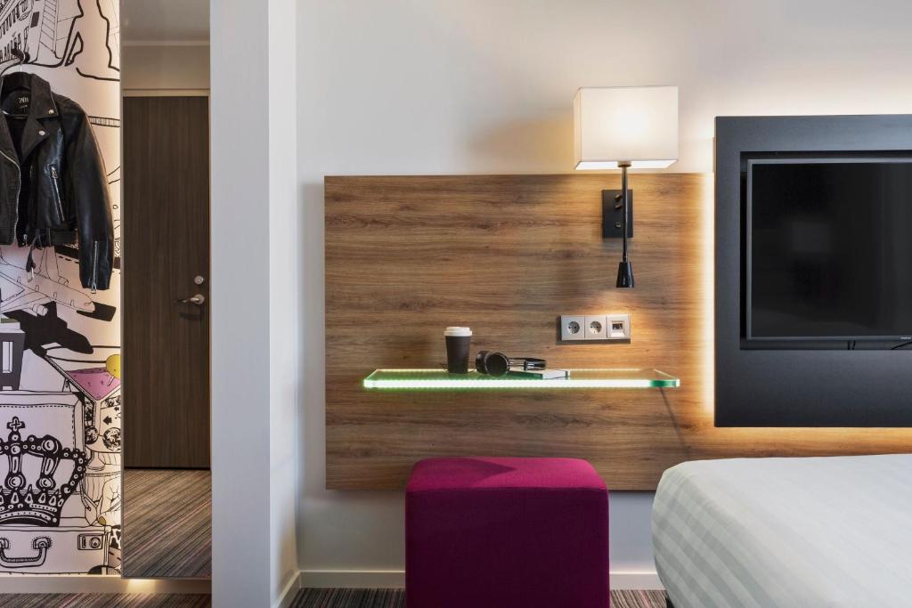 Postel nebo postele na pokoji v ubytování Moxy Copenhagen Sydhavnen
