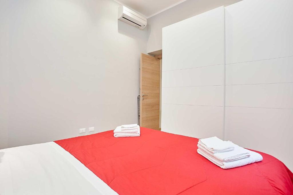 Posteľ alebo postele v izbe v ubytovaní KMC suites - Red