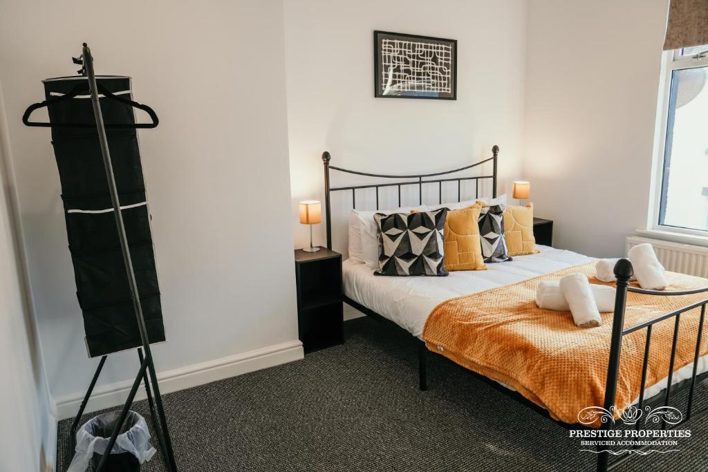 Voodi või voodid majutusasutuse Dover St by Prestige Properties SA toas