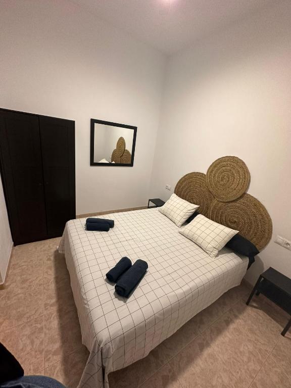 A bed or beds in a room at La casa de la Abuela