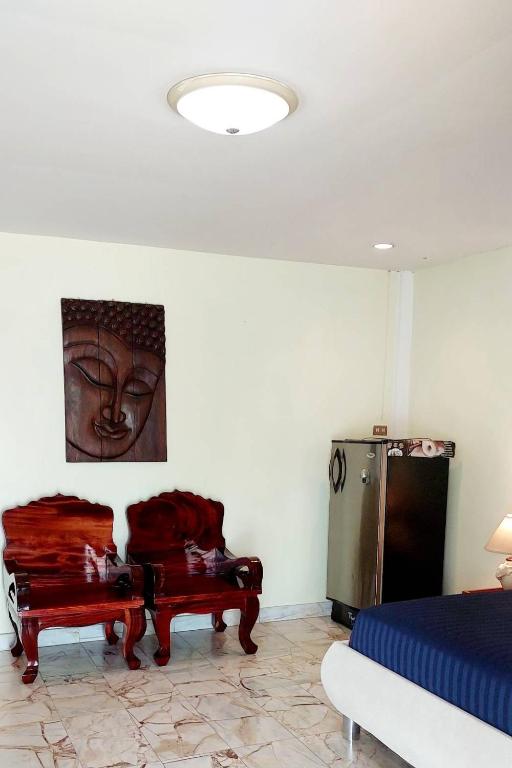 Postel nebo postele na pokoji v ubytování Tientong Guesthouse