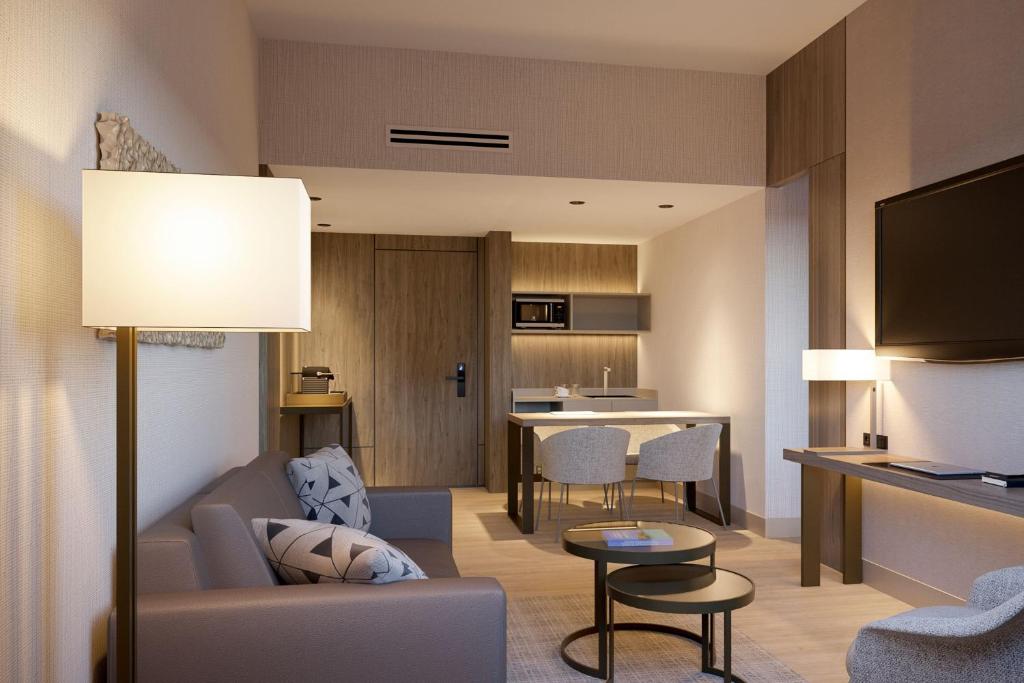 Posezení v ubytování AC Hotel by Marriott Punta Cana