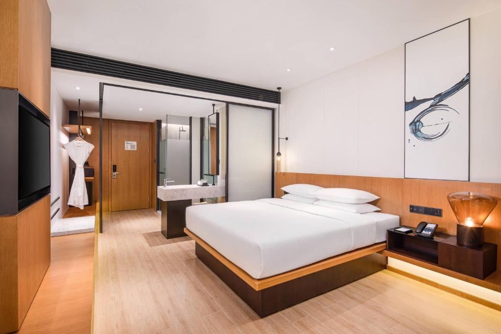 Postel nebo postele na pokoji v ubytování Fairfield by Marriott Foshan Nanhai