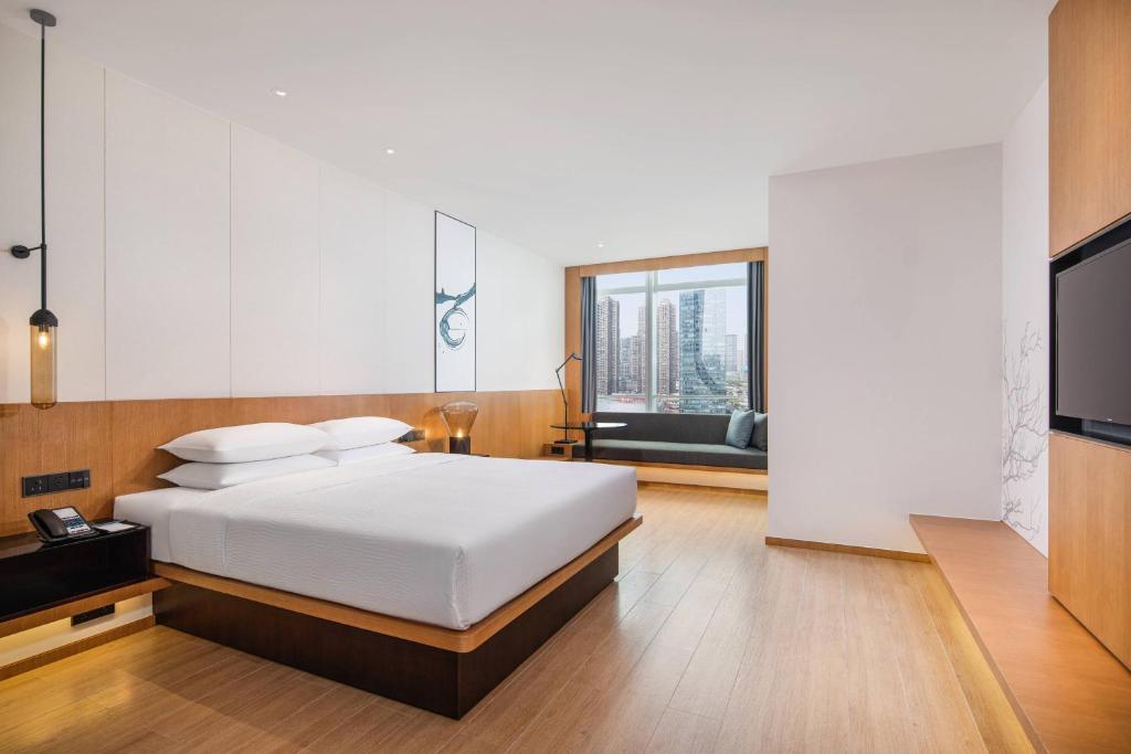 Postel nebo postele na pokoji v ubytování Fairfield by Marriott Foshan Nanhai