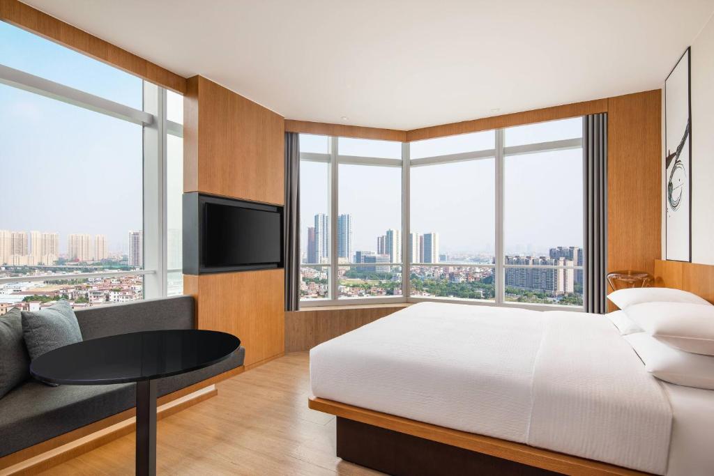 Postel nebo postele na pokoji v ubytování Fairfield by Marriott Foshan Nanhai