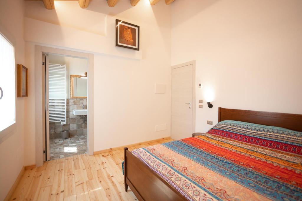 Postel nebo postele na pokoji v ubytování B&B Basta Bussare