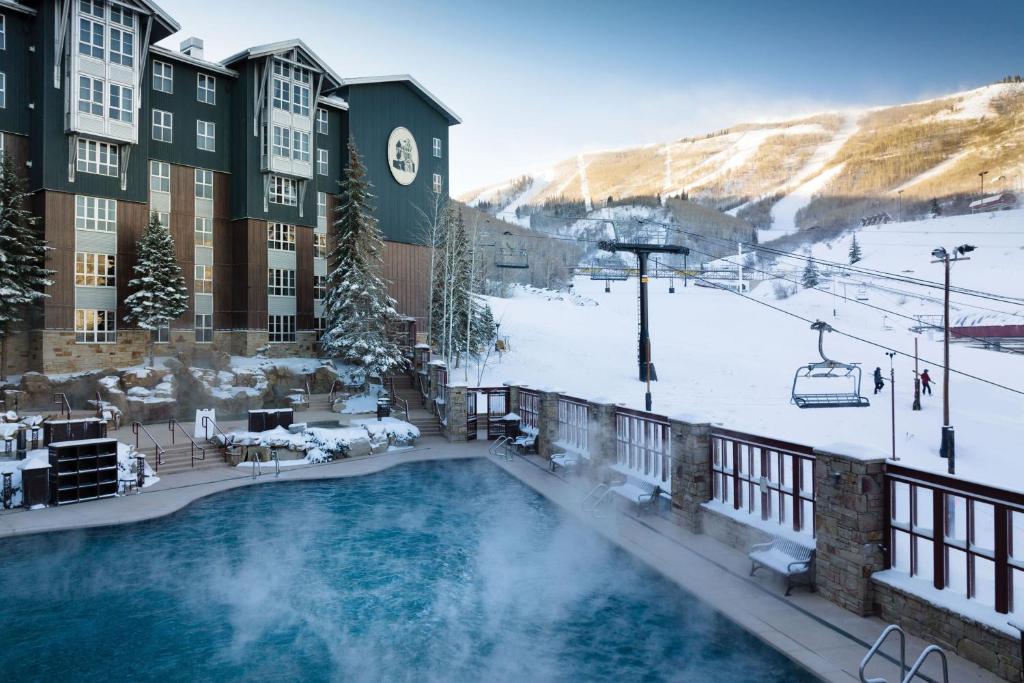 a resort with a snow covered ski slope and a ski lift at Marriott's MountainSide in Park City