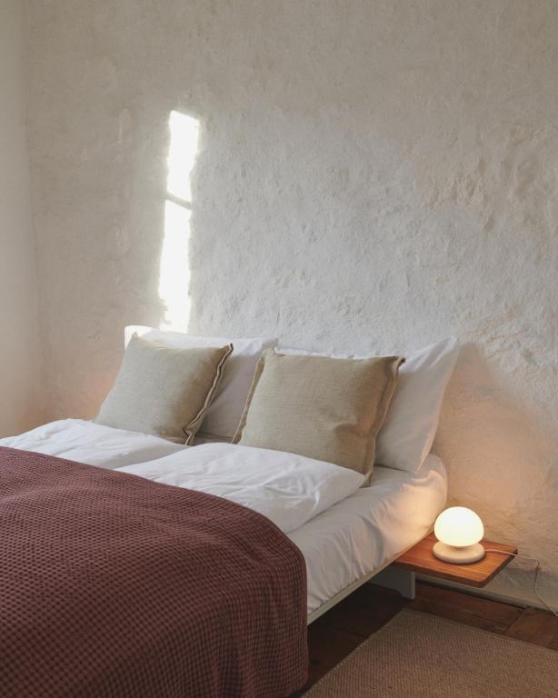 Postel nebo postele na pokoji v ubytování Auberge du Mouton