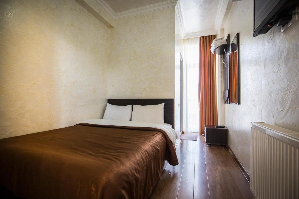Postel nebo postele na pokoji v ubytování Beach House
