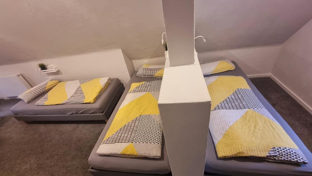 Postel nebo postele na pokoji v ubytování Haus Erdmann