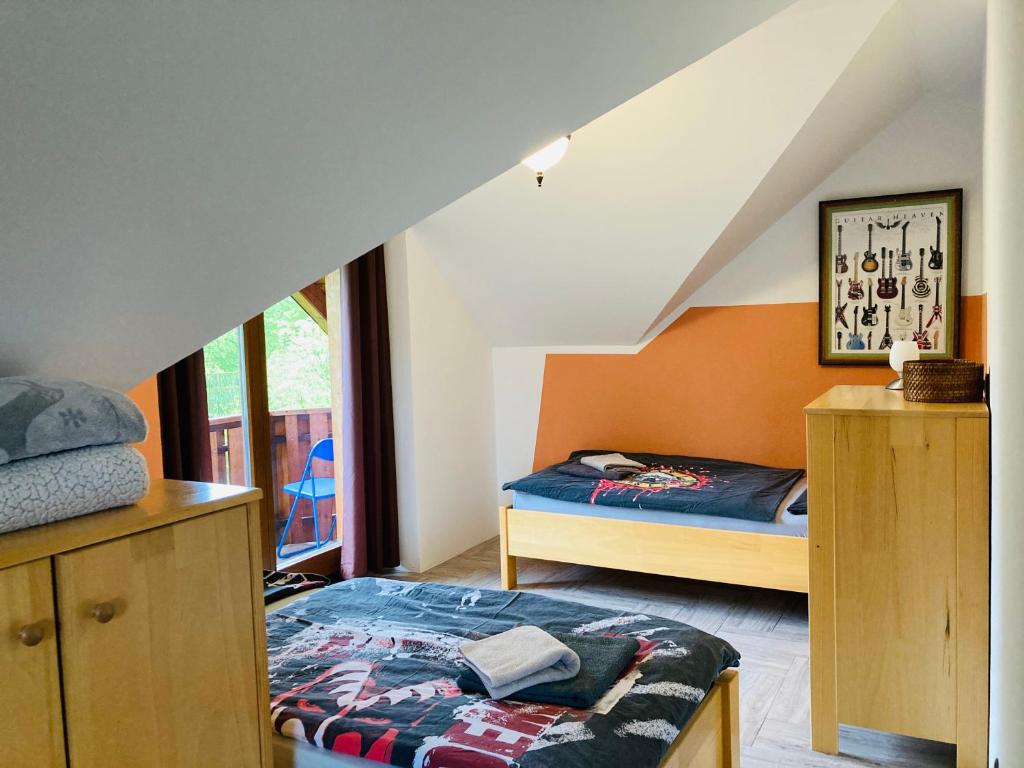 Postel nebo postele na pokoji v ubytování Family House
