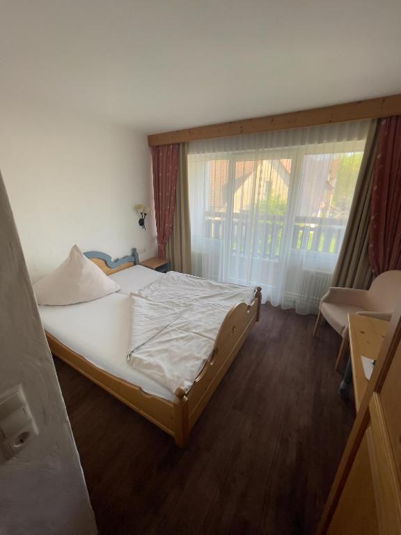 Postel nebo postele na pokoji v ubytování Forsthof