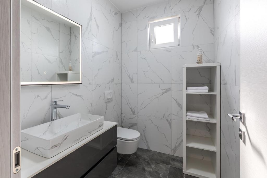 Koupelna v ubytování Luxury Apartments Katarina