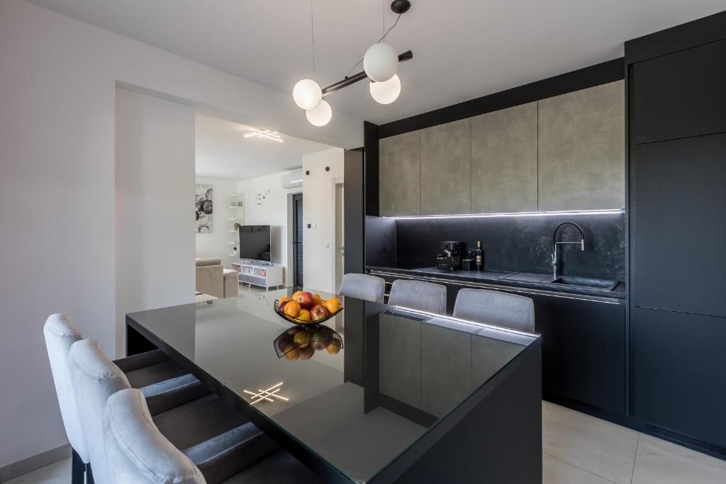 Kuchyň nebo kuchyňský kout v ubytování Luxury Apartments Katarina
