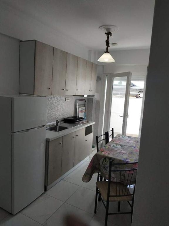 Kuchyň nebo kuchyňský kout v ubytování First line apartment