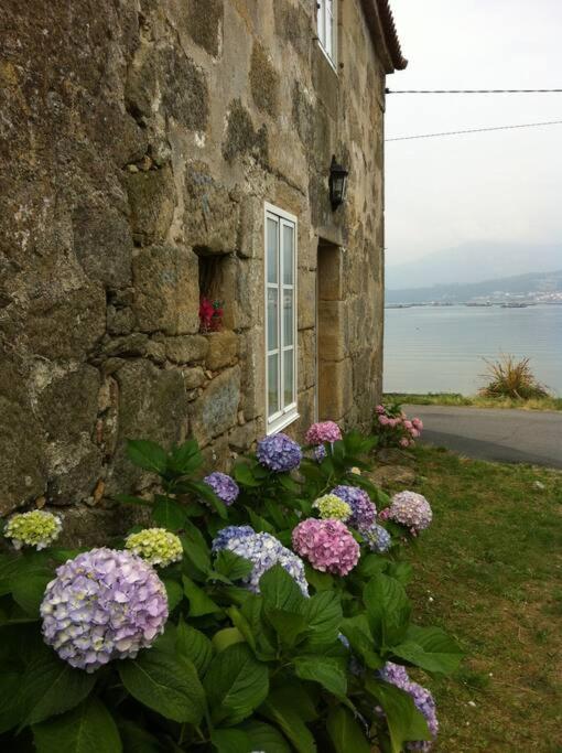 Fotografie z fotogalerie ubytování La Moira - casa de piedra frente al mar v destinaci Esteiro