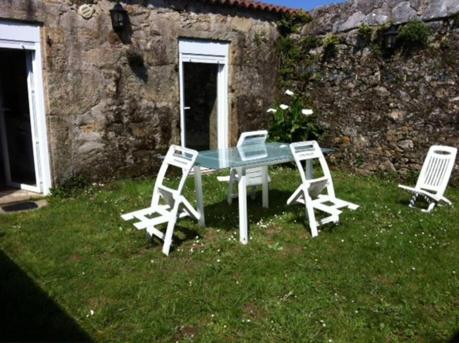 Fotografie z fotogalerie ubytování La Moira - casa de piedra frente al mar v destinaci Esteiro