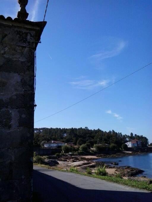 Fotografie z fotogalerie ubytování La Moira - casa de piedra frente al mar v destinaci Esteiro