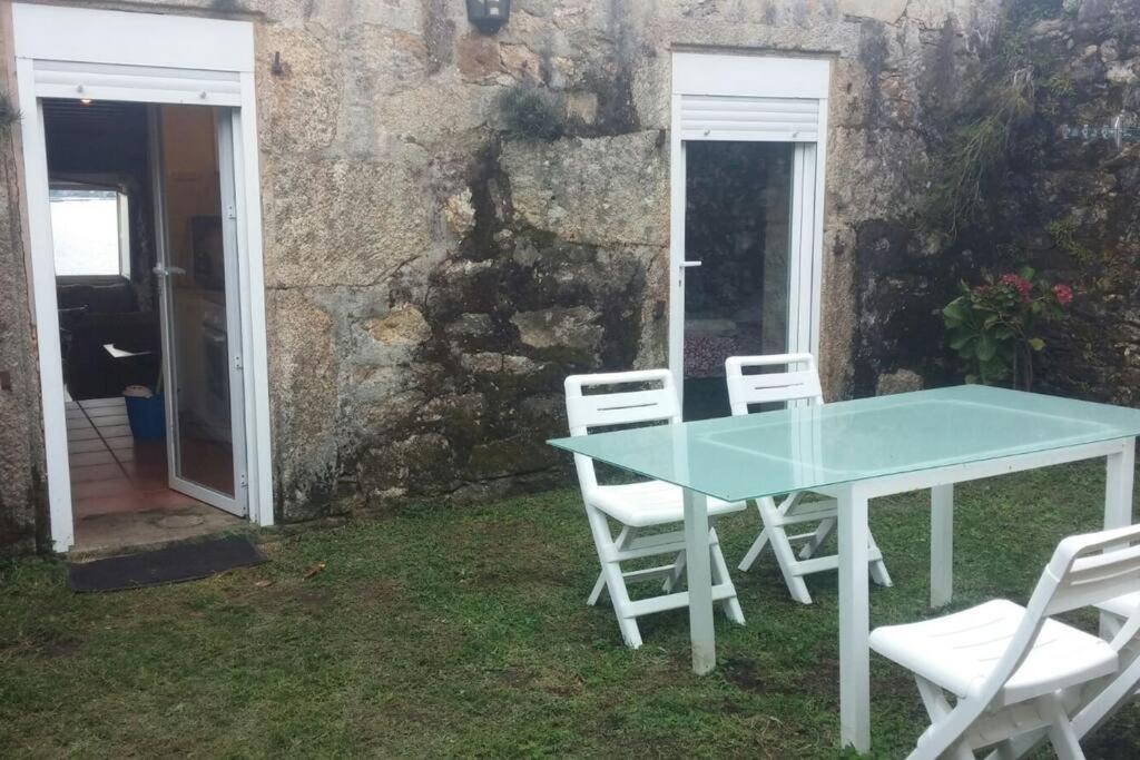 Fotografie z fotogalerie ubytování La Moira - casa de piedra frente al mar v destinaci Esteiro