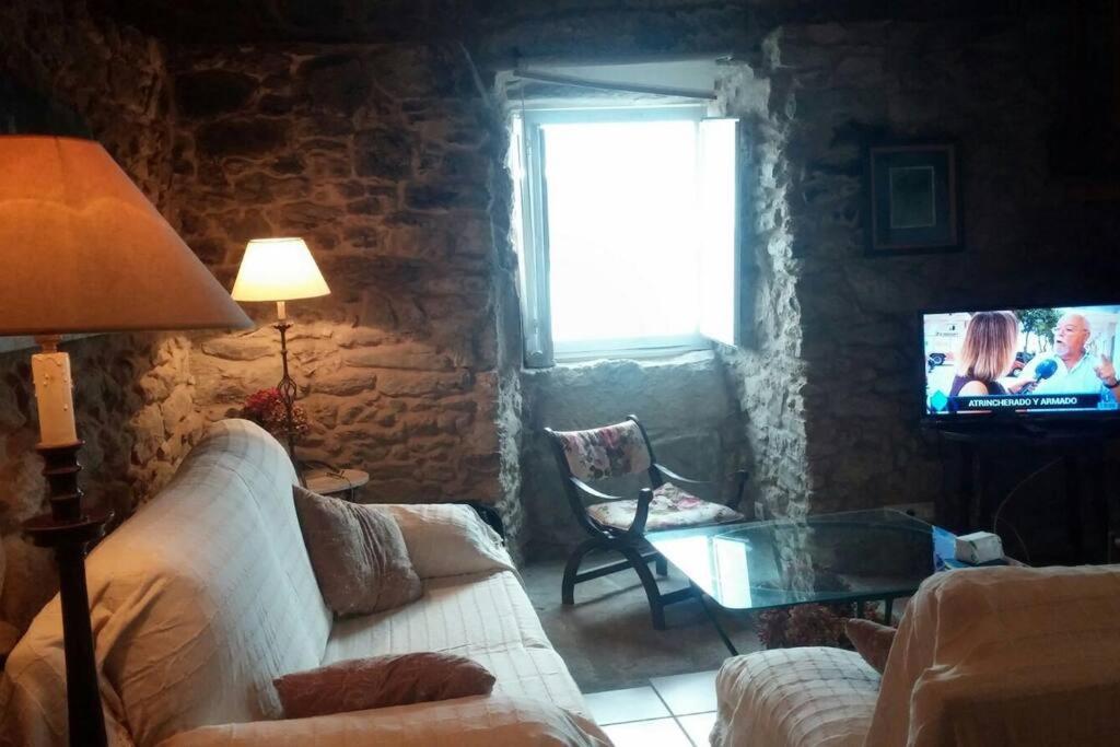 Fotografie z fotogalerie ubytování La Moira - casa de piedra frente al mar v destinaci Esteiro