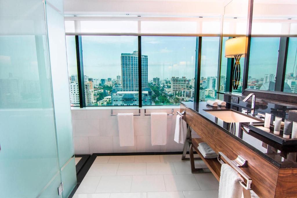 a bathroom with a view of a city at JW Marriott Hotel Santo Domingo in Santo Domingo