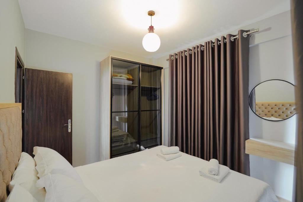 Una cama o camas en una habitación de Casa Del Mar