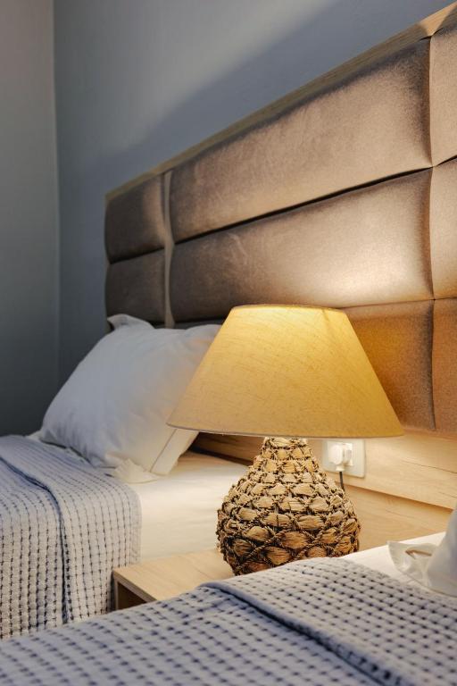Una cama o camas en una habitación de Casa Del Mar