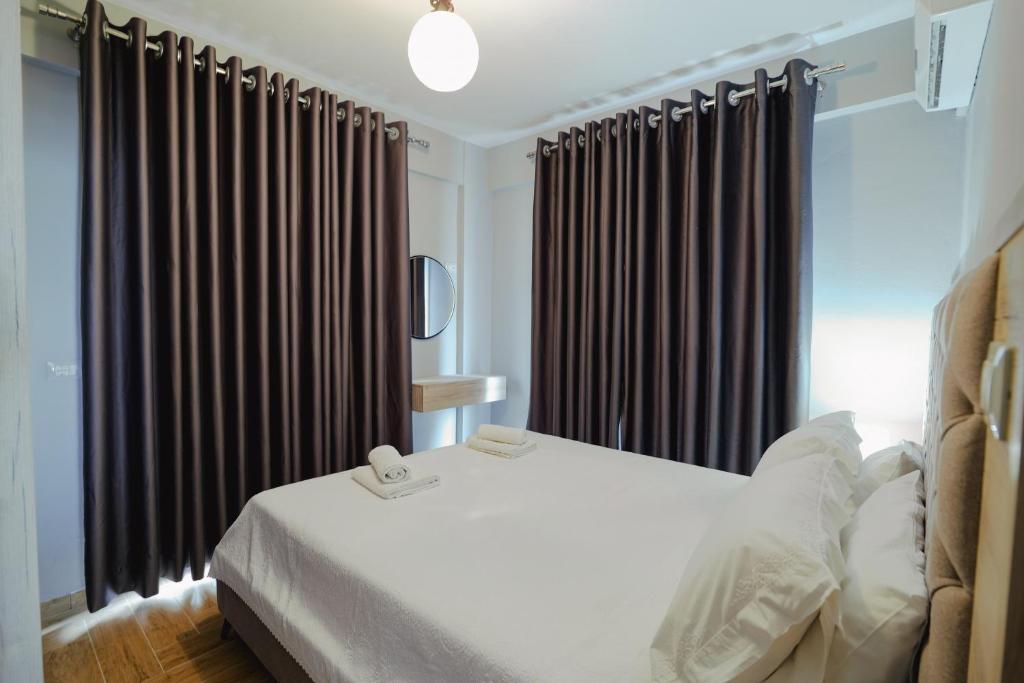 Una cama o camas en una habitación de Casa Del Mar
