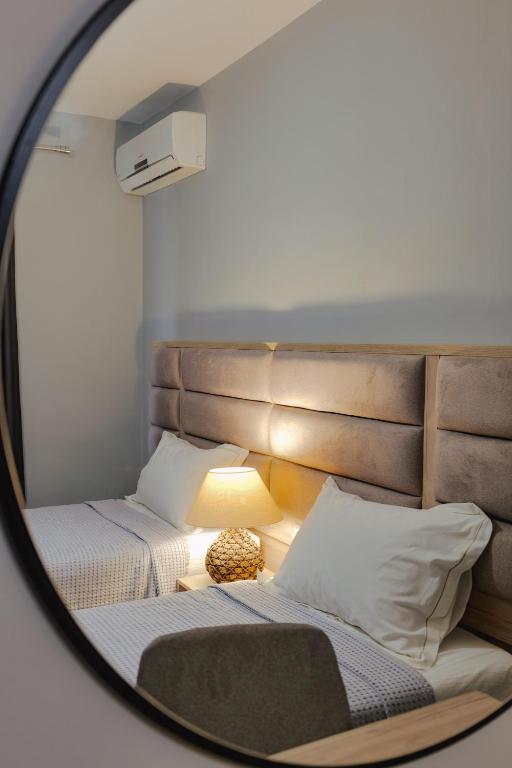 Una cama o camas en una habitación de Casa Del Mar