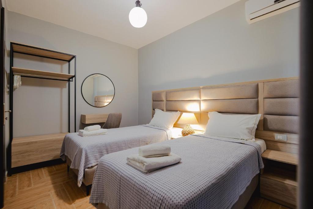 Una cama o camas en una habitación de Casa Del Mar