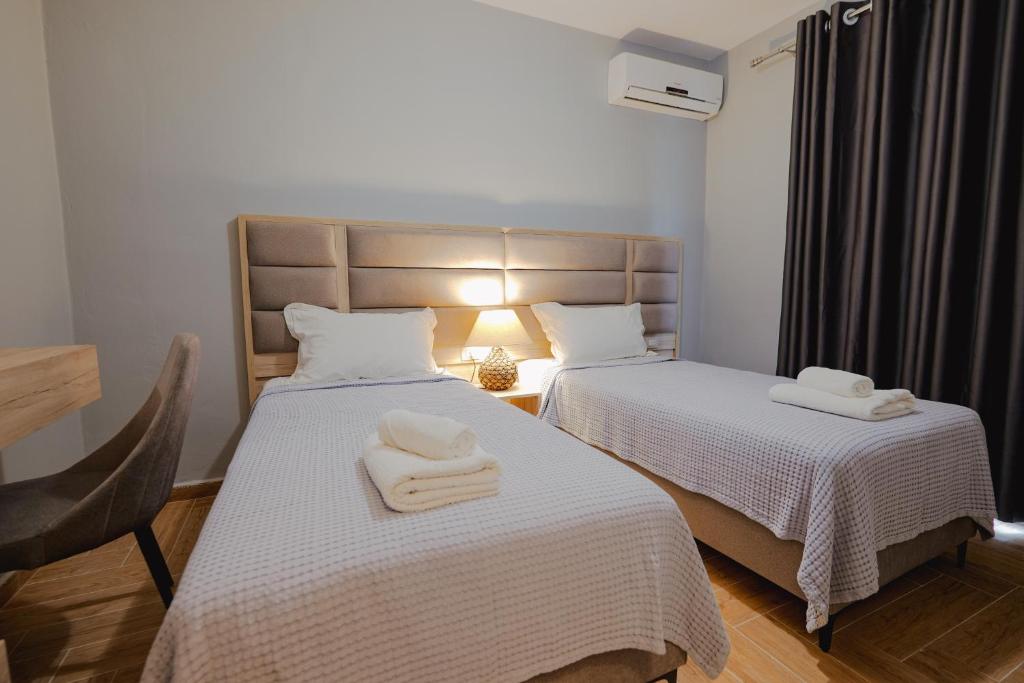Una cama o camas en una habitación de Casa Del Mar