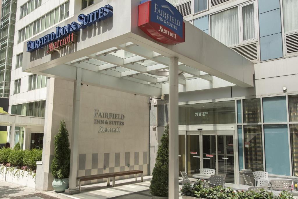 a building with a sign on the front of it at Fairfield Inn & Suites by Marriott New York Manhattan/Fifth Avenue in New York