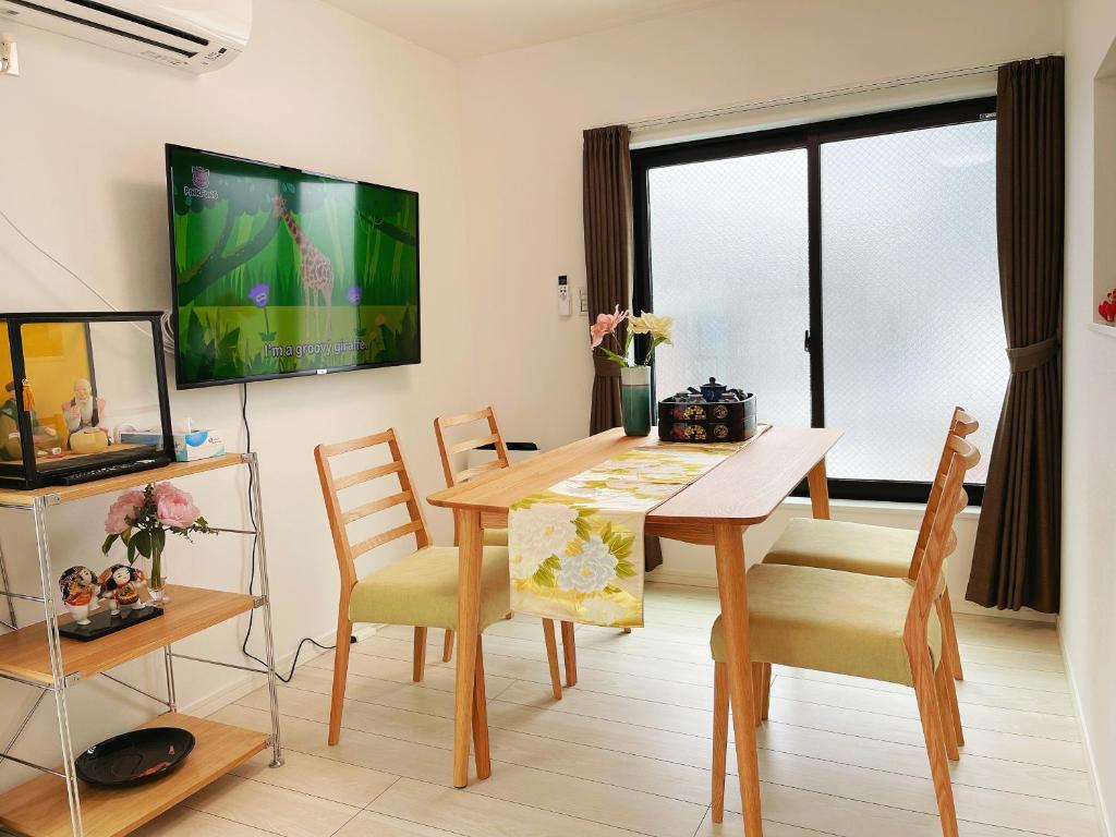 TV a/nebo společenská místnost v ubytování Real Okubo Apartment Hotel