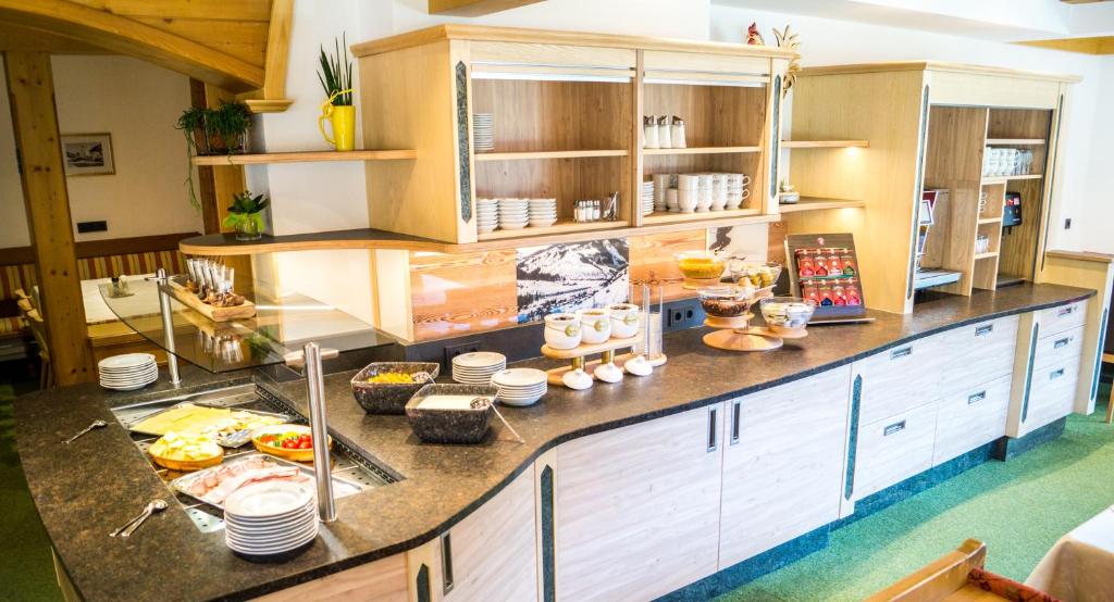 Kuchyň nebo kuchyňský kout v ubytování Apart-Hotel Forellenhof