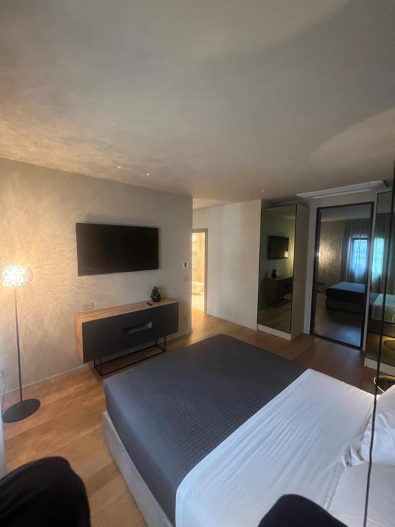Postel nebo postele na pokoji v ubytování Al Castello Luxury B&B
