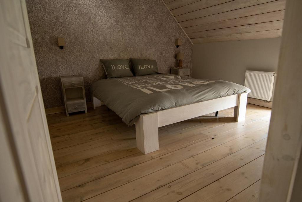 Postel nebo postele na pokoji v ubytování Bed and Breakfast Paellepelhoeve