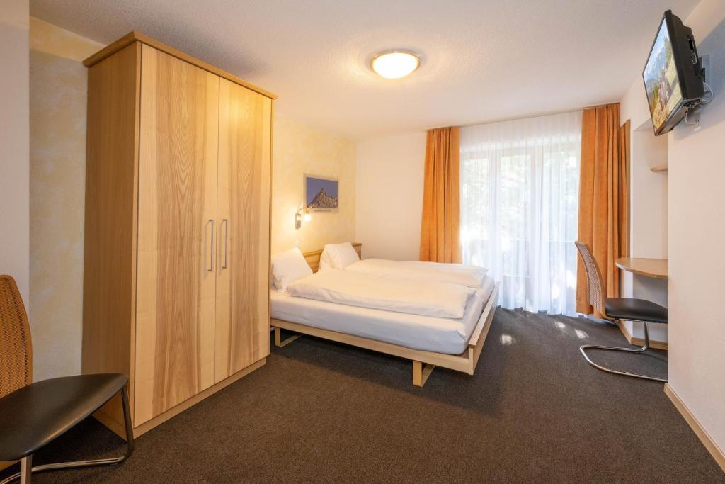 TV a/nebo společenská místnost v ubytování Aktiv Hotel & Spa Hannigalp