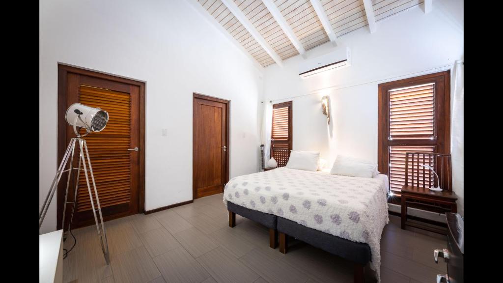 Room in Villa - Bonjour Stay - Villa Mi Cunaにあるベッド