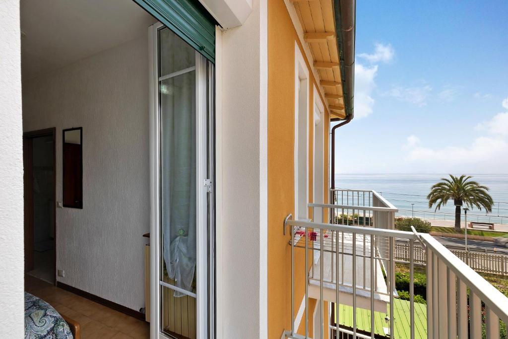 a balcony with a view of the ocean at Numero 10 in Pietra Ligure