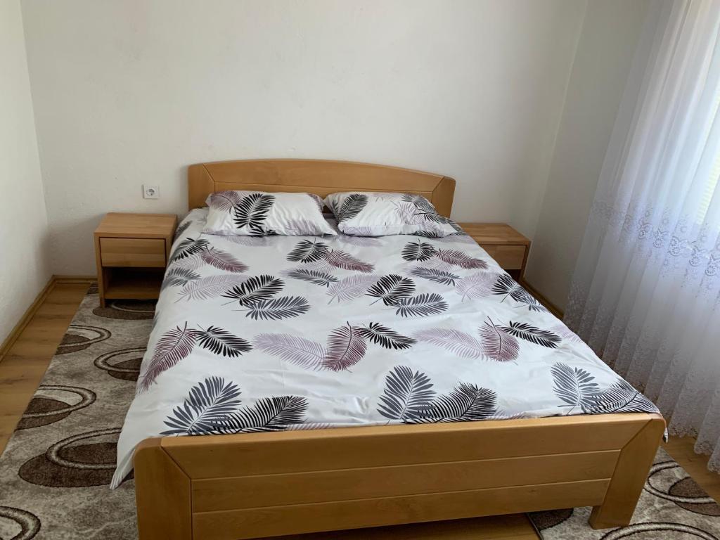 Un pat sau paturi într-o cameră la Dubrave