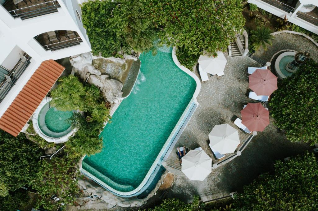 Bazén v ubytování Parador Nature Resort and Spa nebo v jeho okolí