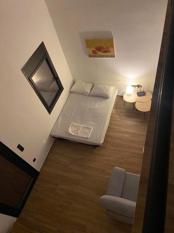Postel nebo postele na pokoji v ubytování OLIVOMARE