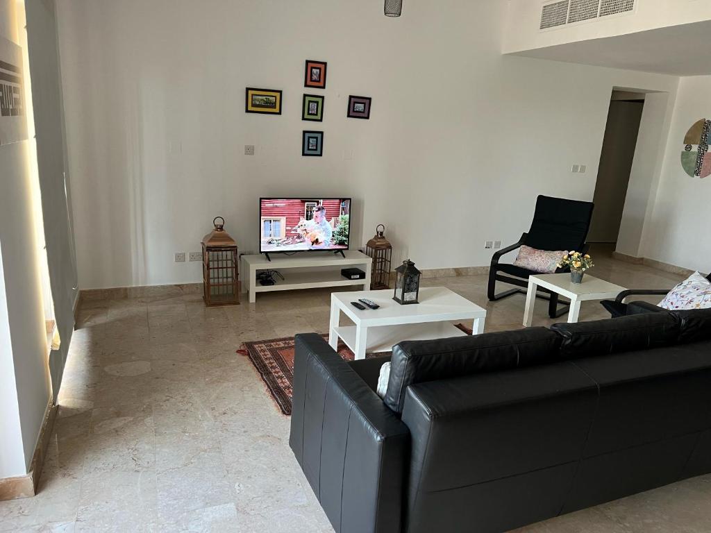 TV a/nebo společenská místnost v ubytování Apartment in Jebel Sifah