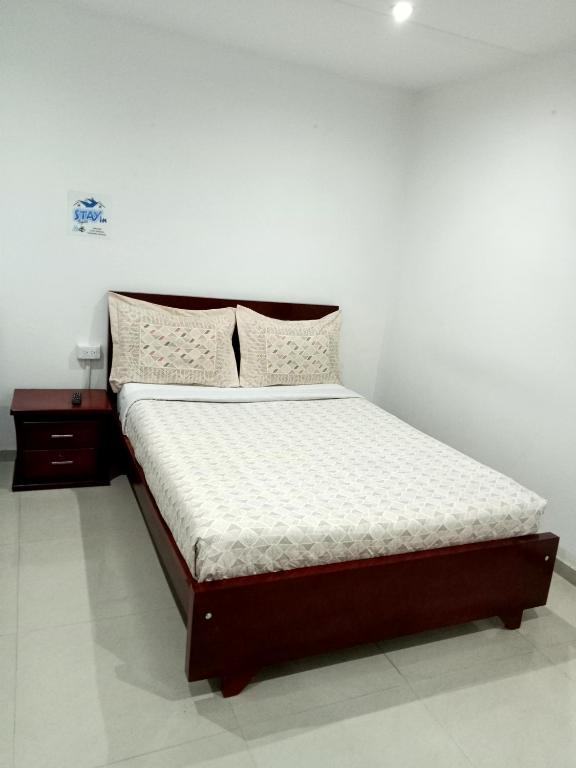 Postel nebo postele na pokoji v ubytování Stay In Bogota