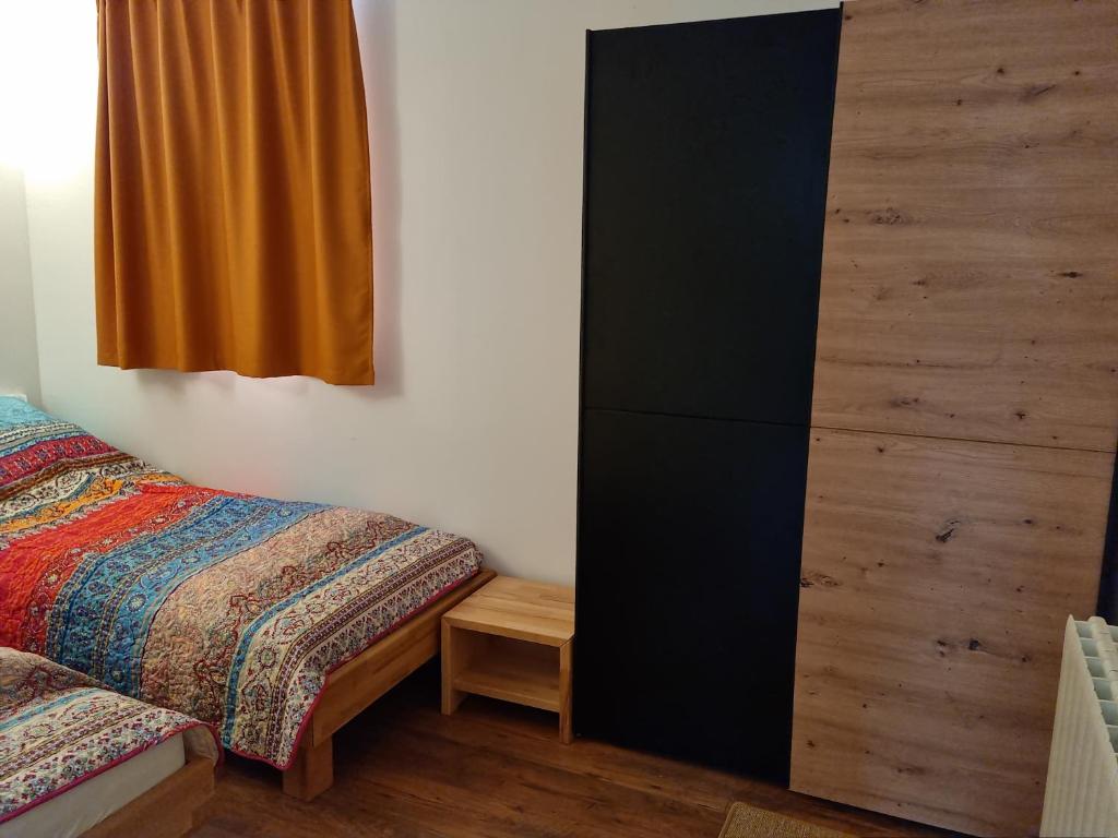 Łóżko lub łóżka w pokoju w obiekcie Villa Rossi