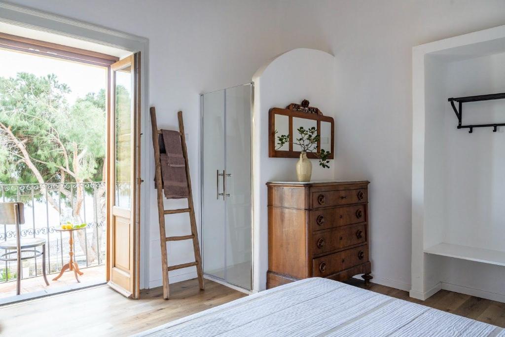 Postel nebo postele na pokoji v ubytování Iancura - B&B di design a Salina