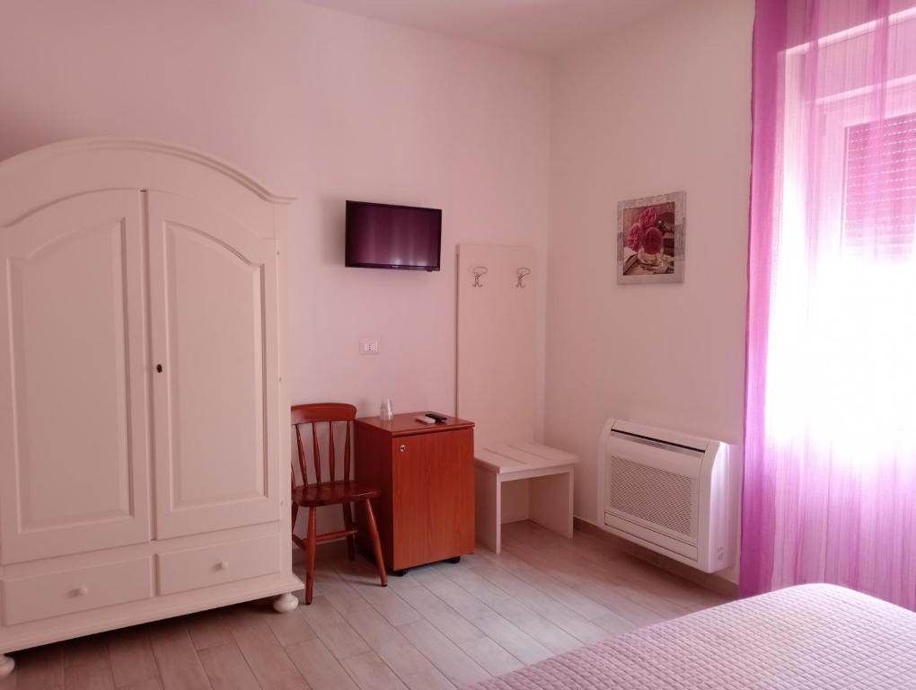 Postel nebo postele na pokoji v ubytování Casa Nova b&b